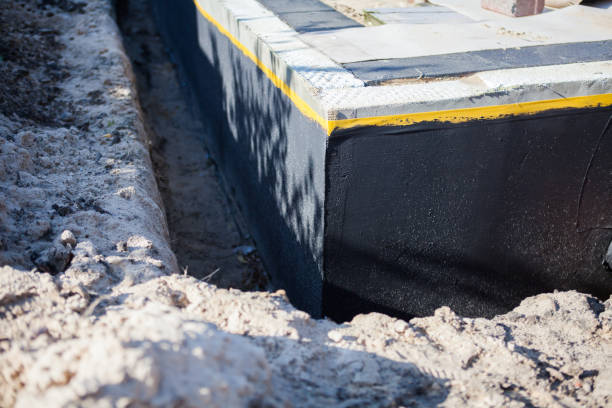 Professional Basement Waterproofing technician working in Bethlehem, NC